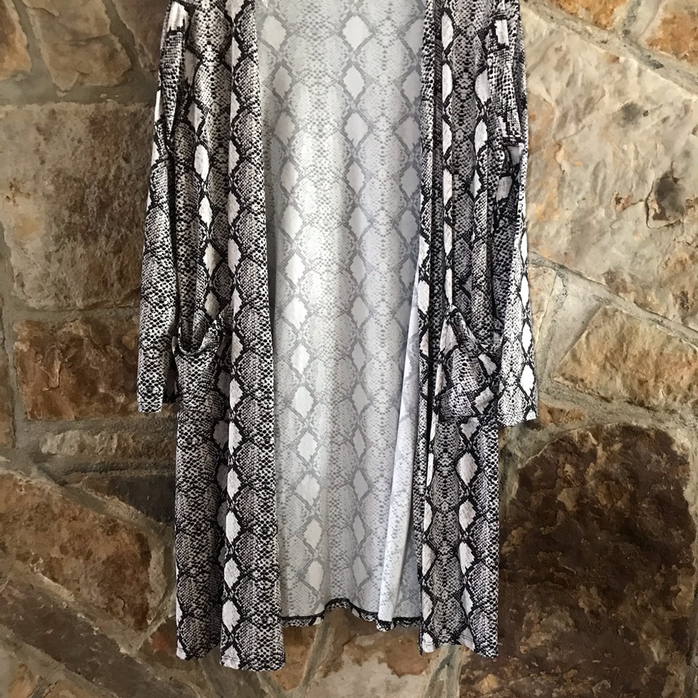Snake skin duster. Never worn. Washed once.